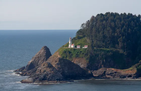 Heceta Head Lighthouse on its headland, Oregon