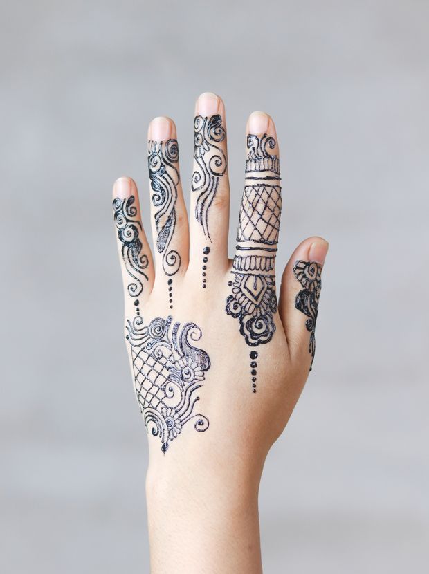 Elegant Arabic henna pattern on a hand