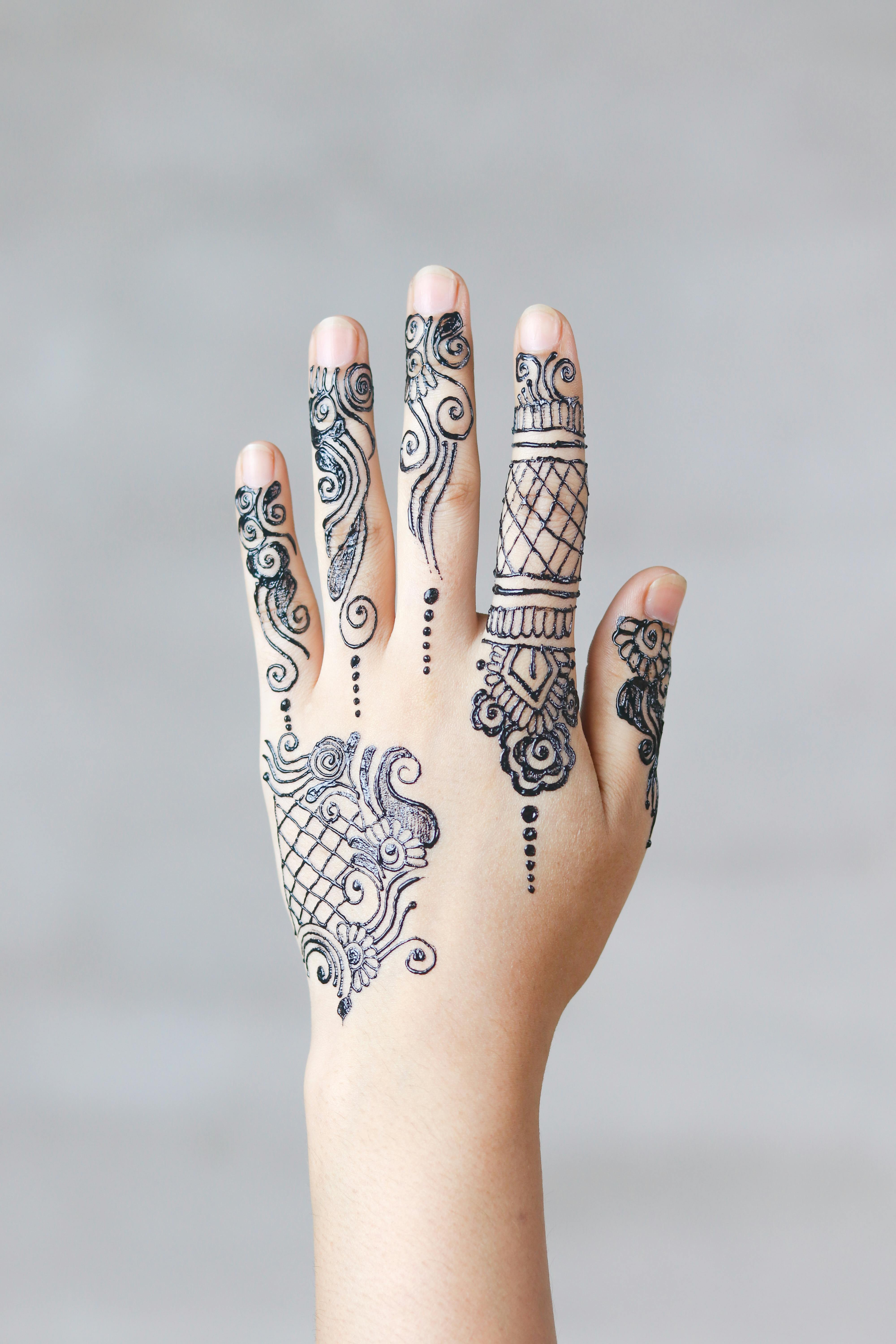 A Hand With Mehndi Tattoo Free Stock Photo