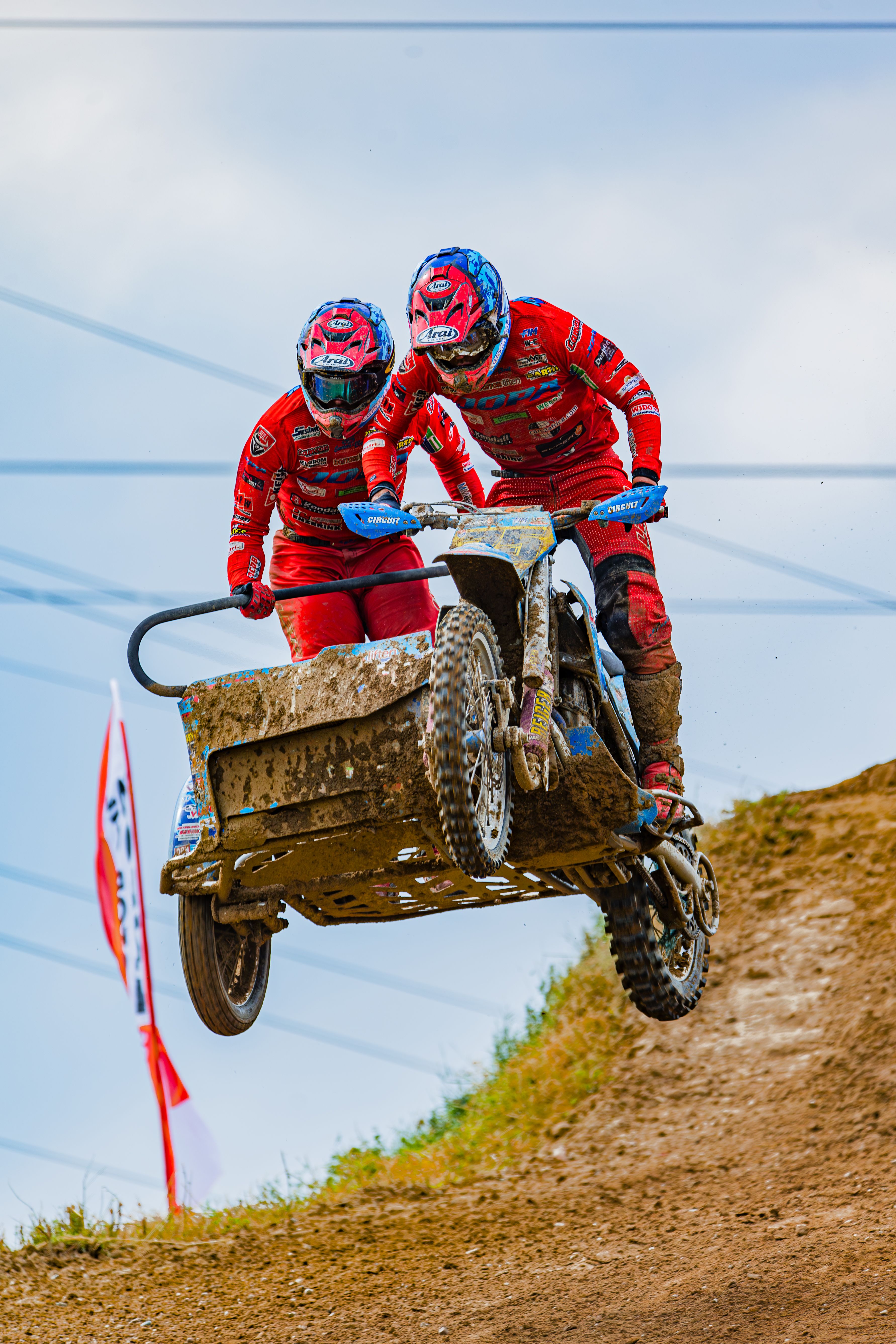 Sidecarcross Bikers Midair during Race · Free Stock Photo