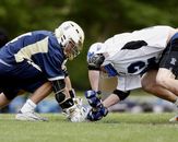 Selective Focus Photography of Two Men Playing American Football