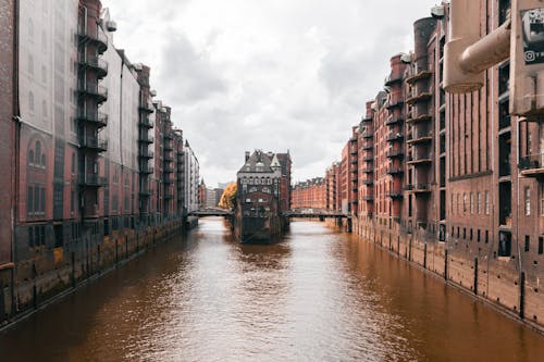 A canal in a city with buildings on both sides