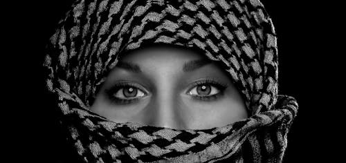 Monochrome Photo of Person Wearing Hijab