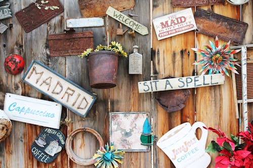 Assorted-color Signage Lot on Brown Wall