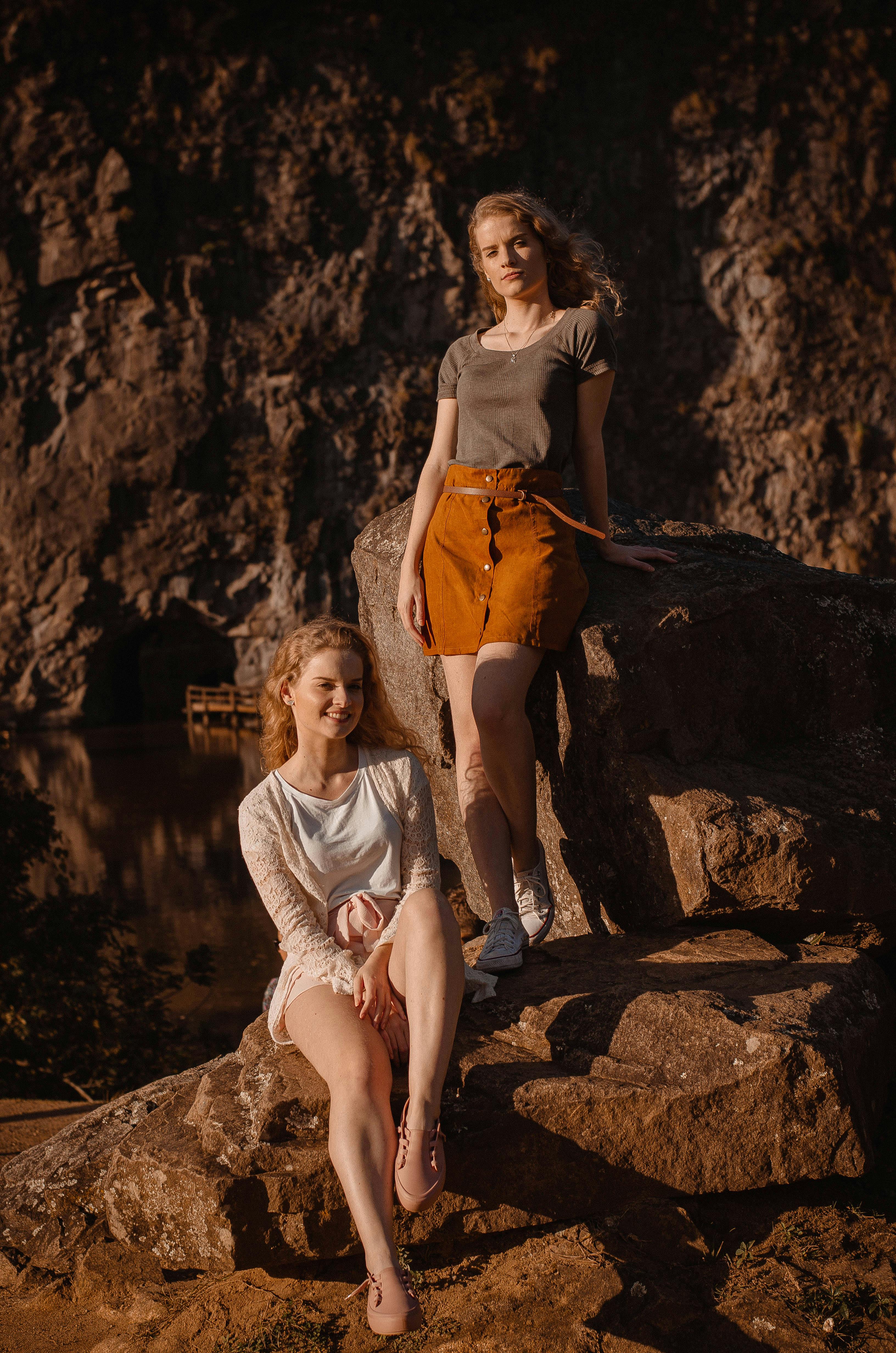 women wearing gray tank top and brown miniskirt