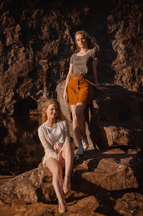 Free Women Wearing Gray Tank Top and Brown Miniskirt Stock Photo