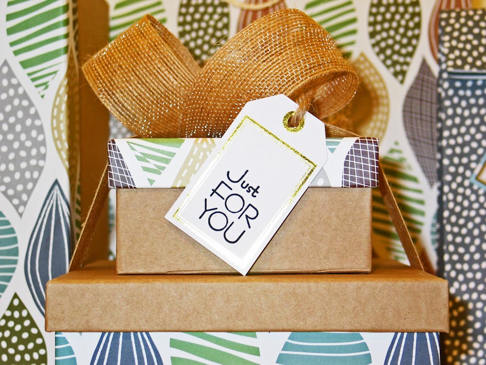 Free Close-up Photo of Gift Boxes with Greeting Card Stock Photo