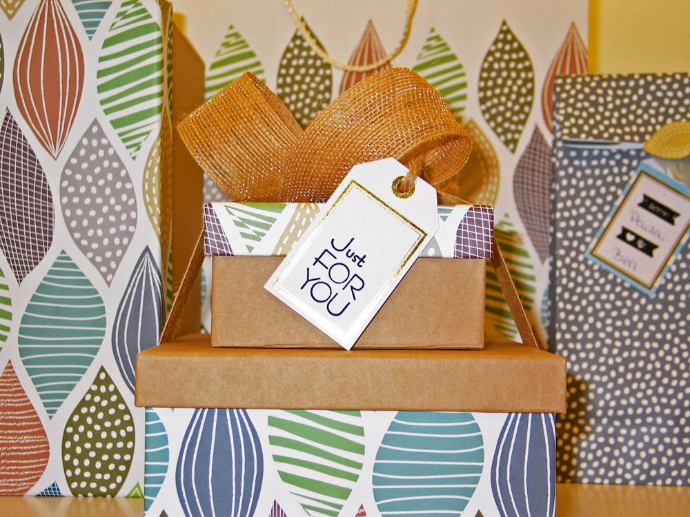 Free Close-up Photo of Gift Boxes with Greeting Card Stock Photo