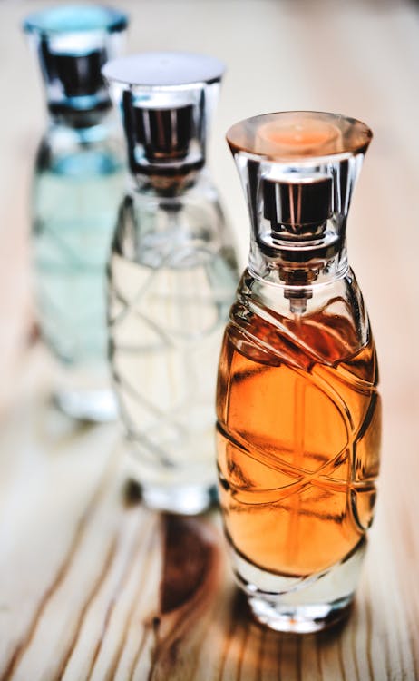 Free Three Perfume Bottles Stock Photo