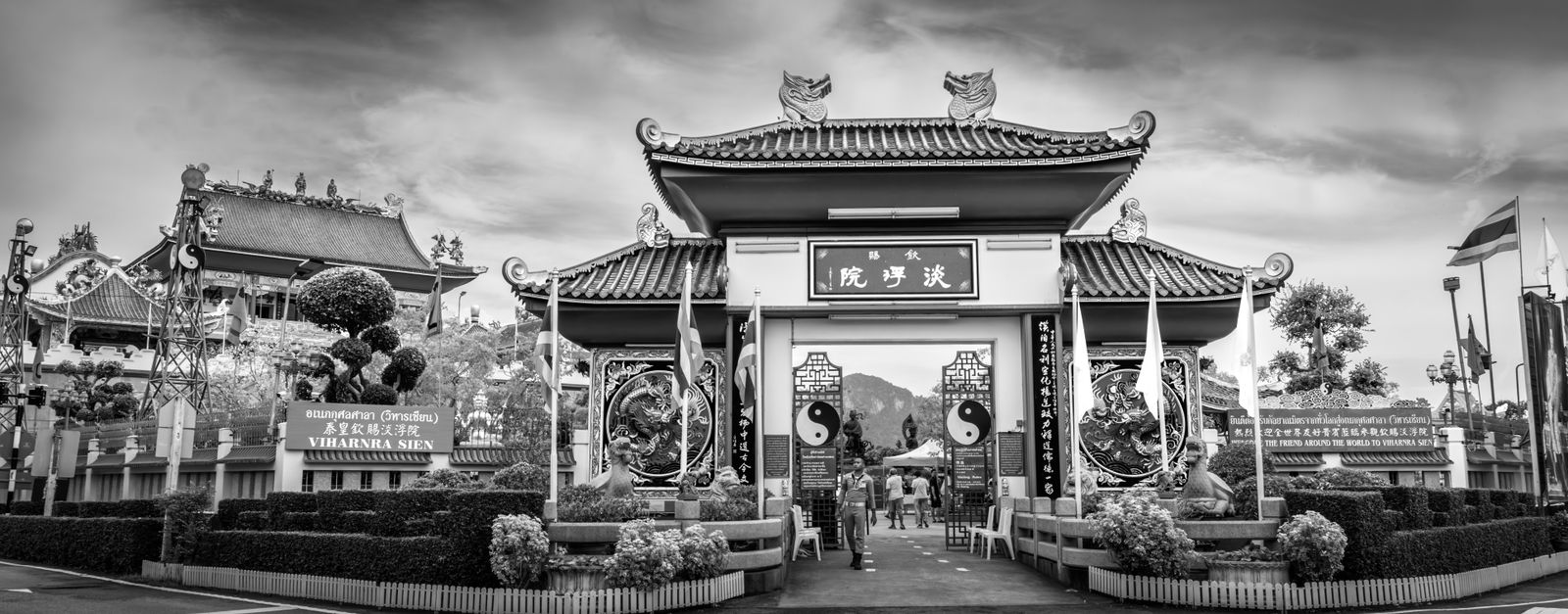 A striking black and white image of Viharnra Sien Museum entrance in Pattaya City, Thailand.