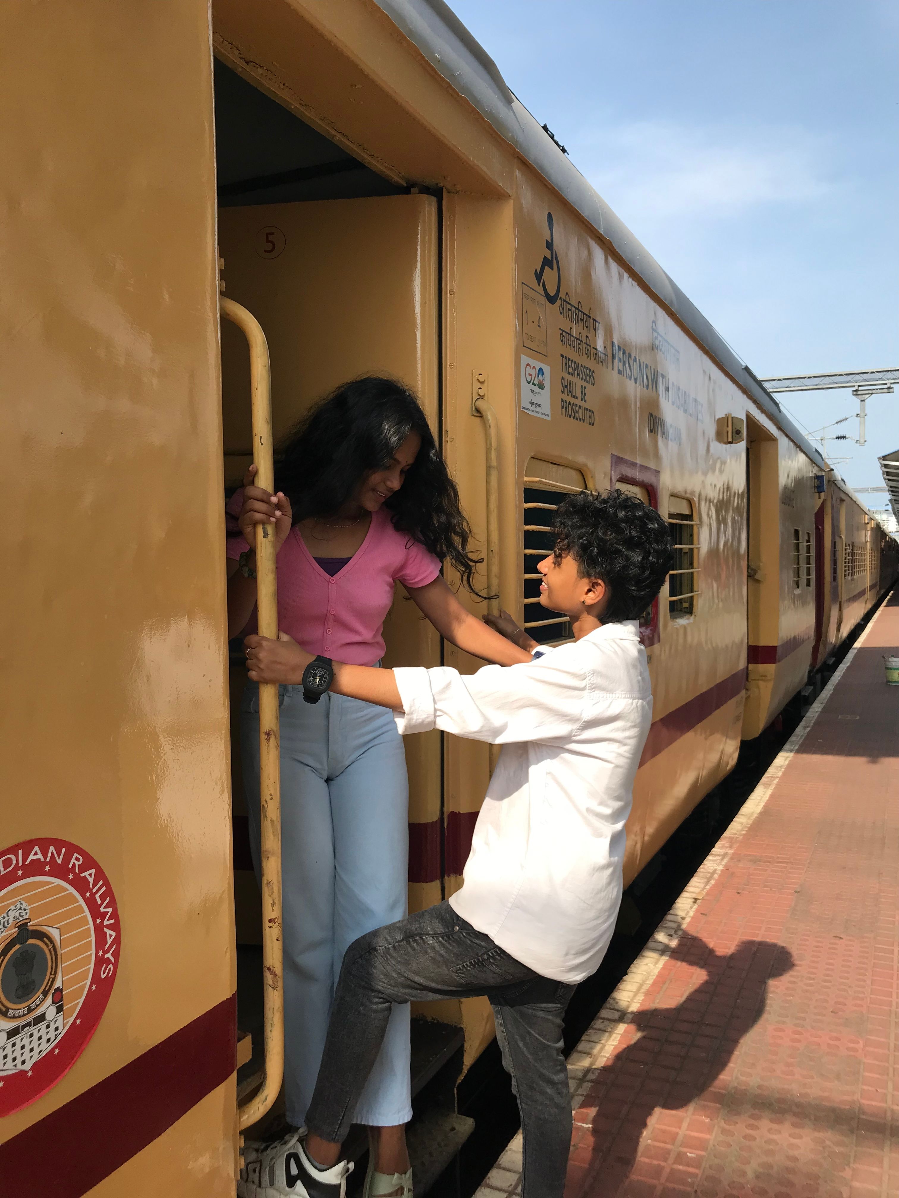 Couple Hugging in Train Door · Free Stock Photo