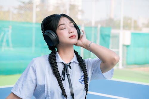 Free Girl Listening to Music  Stock Photo