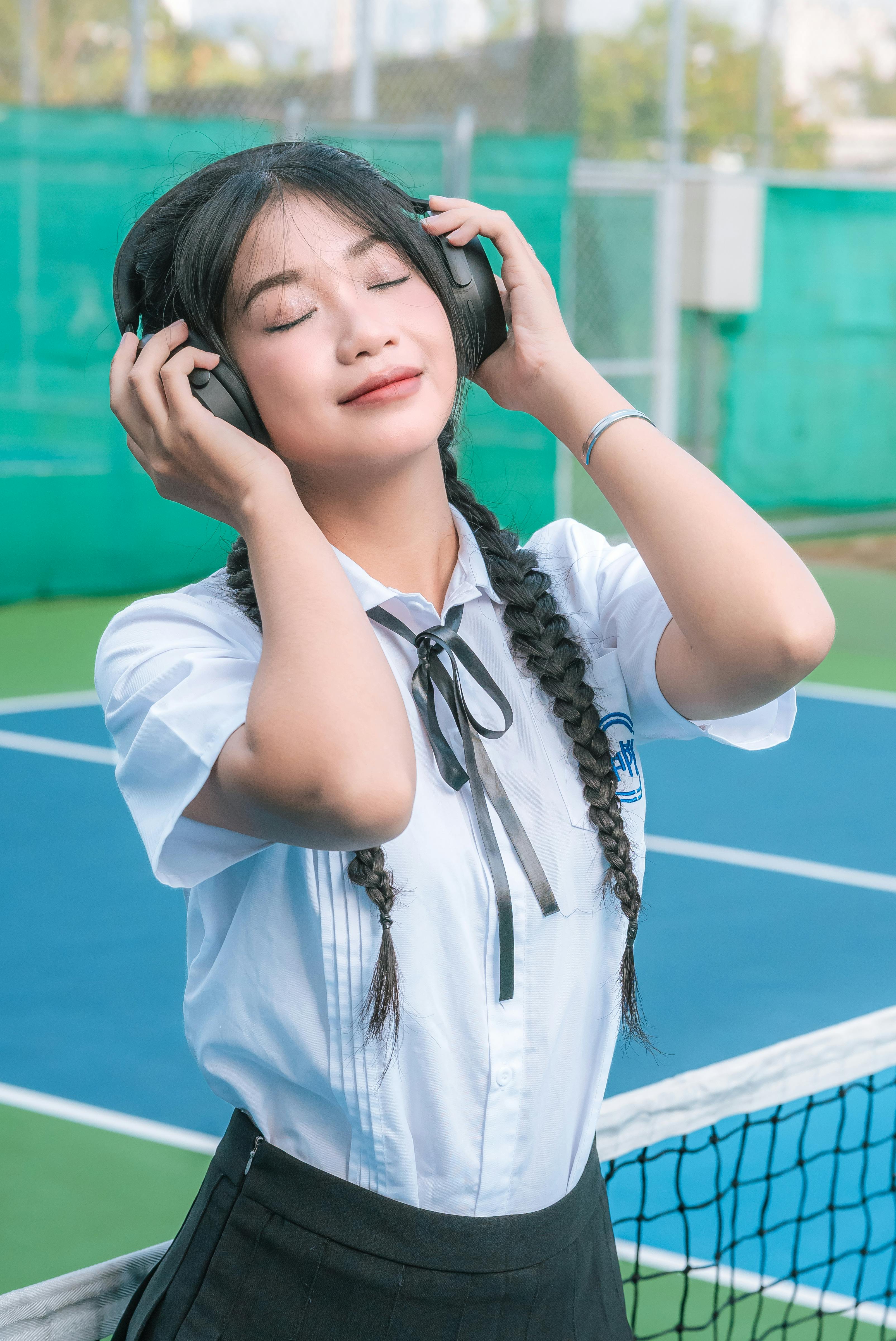 girl wearing headphones