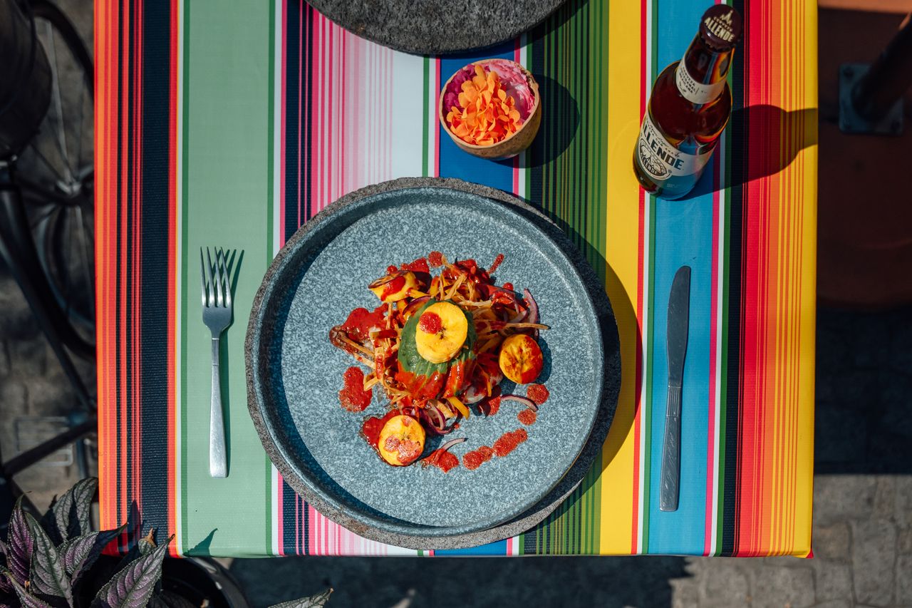 vibrant mexican dining experience featuring a plated meal and craft be