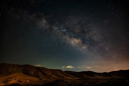 Free Breathtaking view of star-filled night sky and Milky Way over a Spanish desert in CN, Spain. Stock Photo