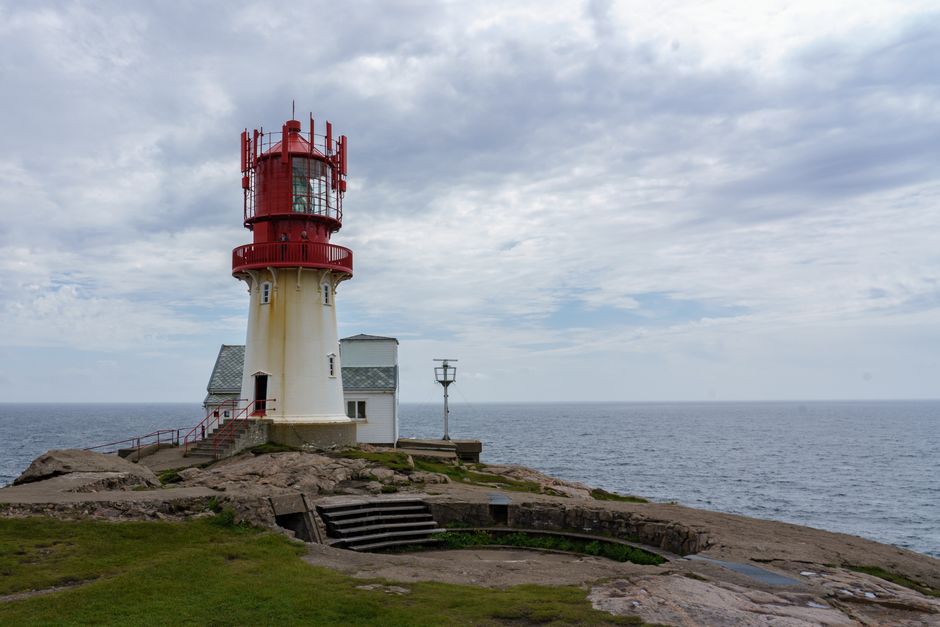 lighthouse rocky coast night