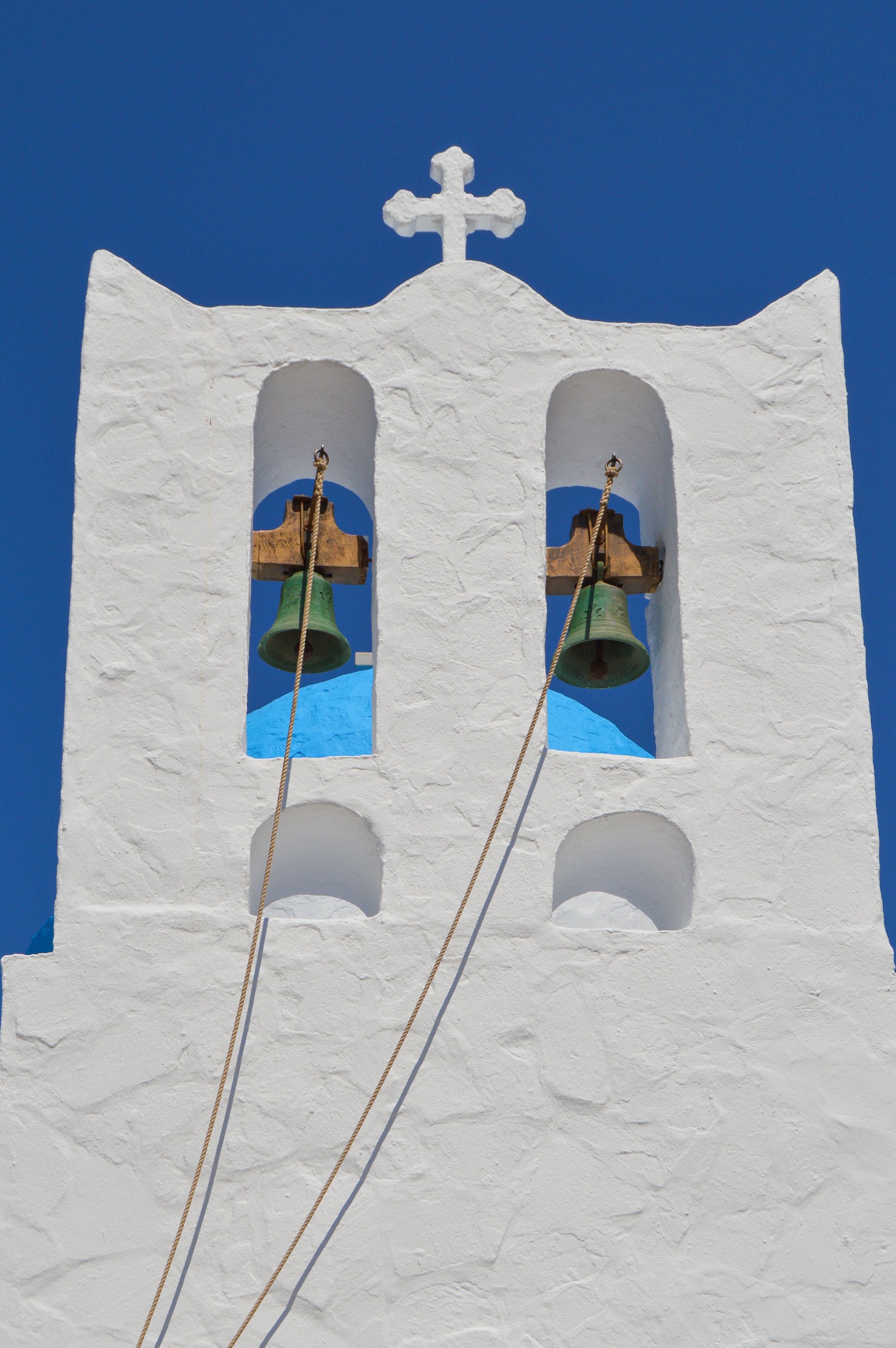 View of a Bell Tower of a Church with White Exterior · Free Stock Photo