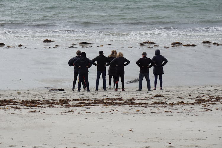 Group Of People On A Beach 