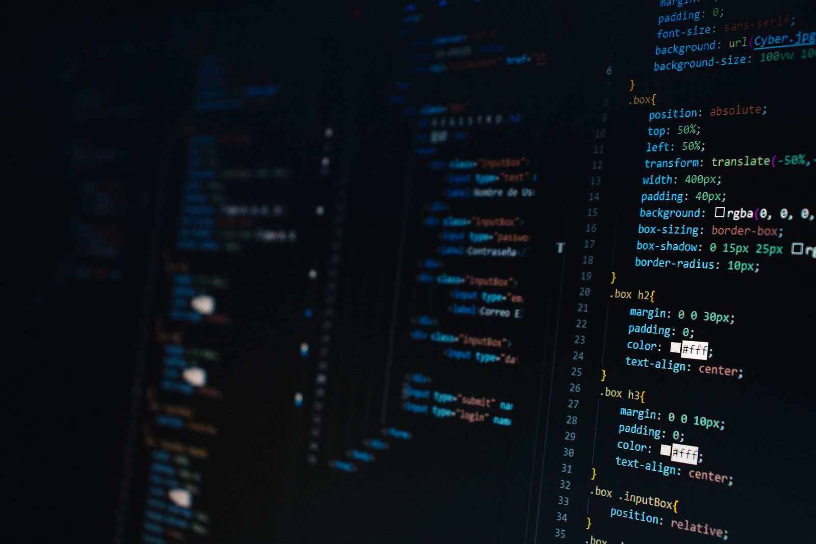 Close-up of CSS code showing box-shadow and background-image properties on a dark screen