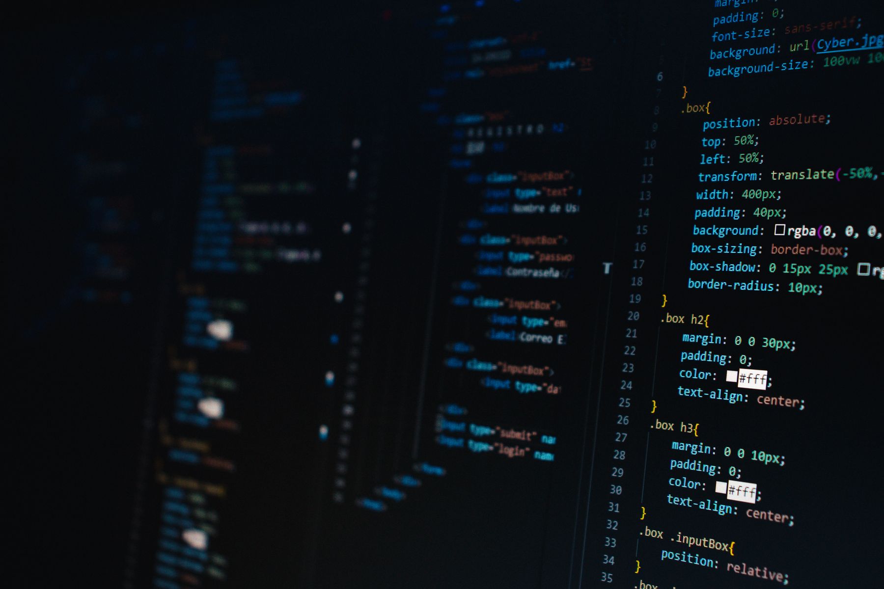 Website code on a dark screen