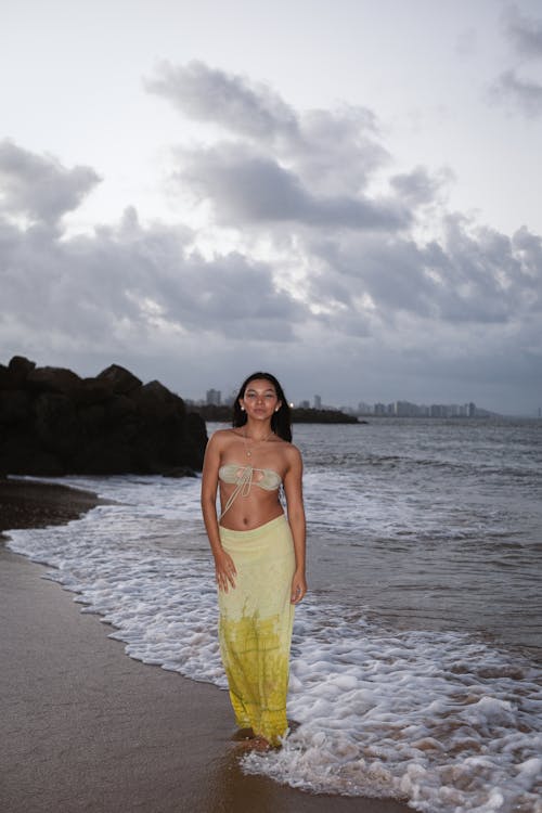 Woman Standing on a Beach 