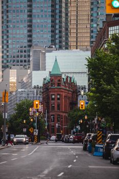 Discover Toronto's urban charm with the historic Gooderham Building framed by modern skyscrapers.