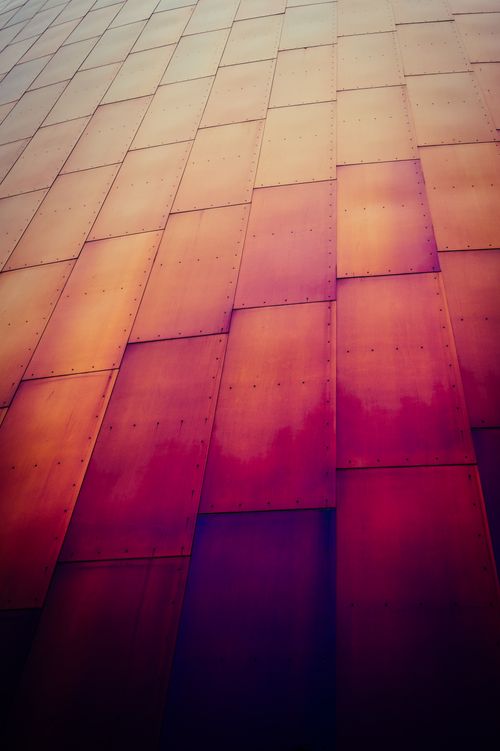 Free Abstract view of colorful rusted metal panels in Seattle, showcasing urban industrial design. Stock Photo