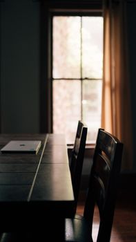 Elegant home workspace in Gainesville, Florida with natural lighting through a window.