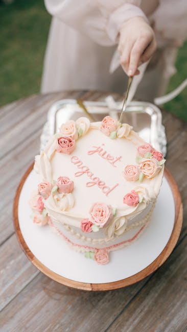 Elegant engagement cake with floral decorations