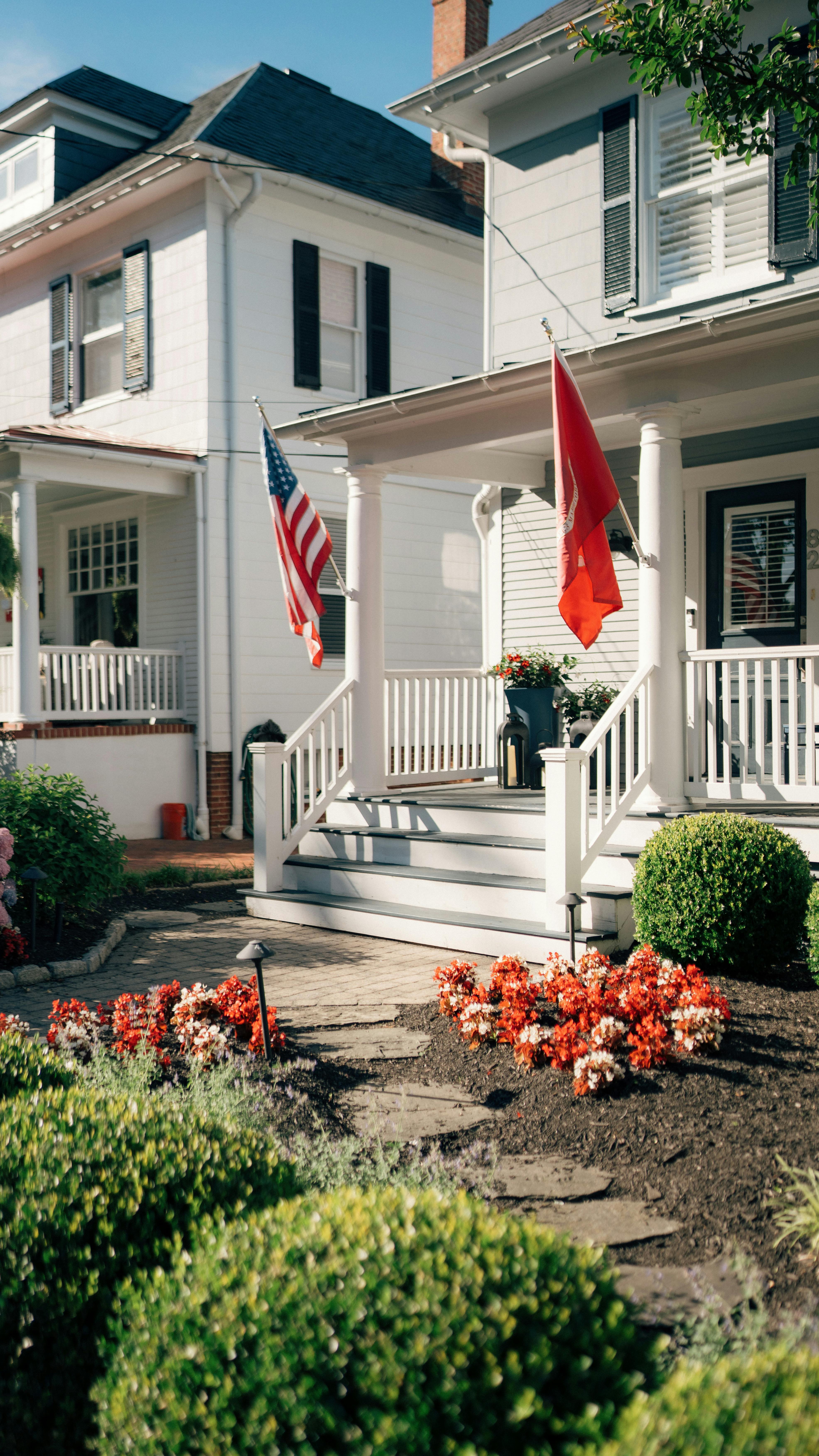 white porch with flags