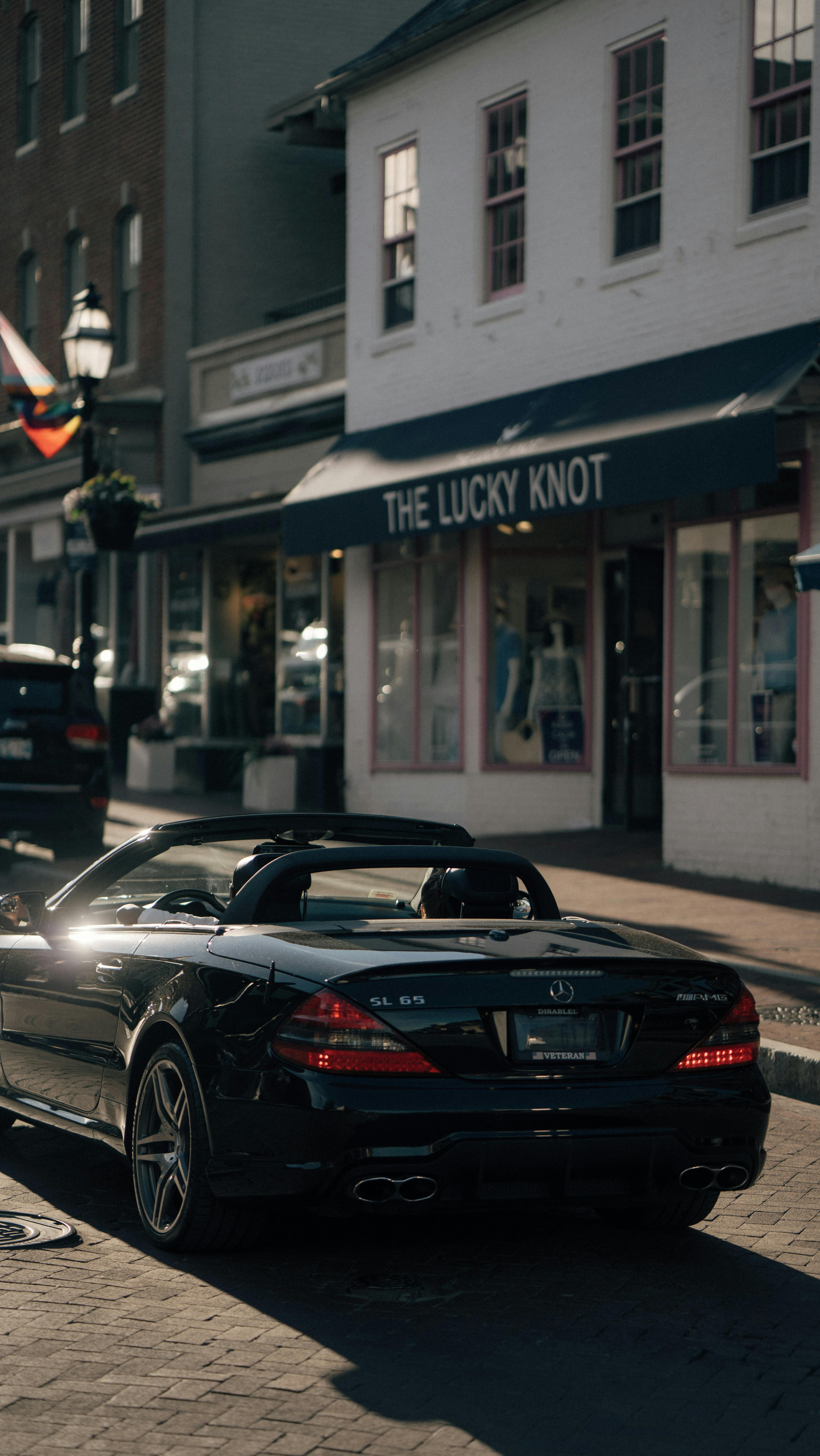 mercedes benz sl parked on a street