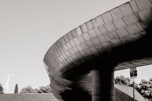 Free Sleek modern architecture captured in a black and white urban setting, showcasing a futuristic design. Stock Photo