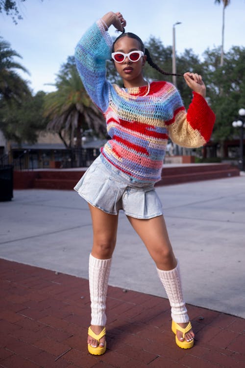 Woman in knitted Sweater and Yellow Sandals