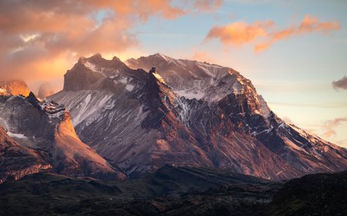 Free Breathtaking view of Torres del Paine mountains at sunset with snowcapped peaks. Stock Photo