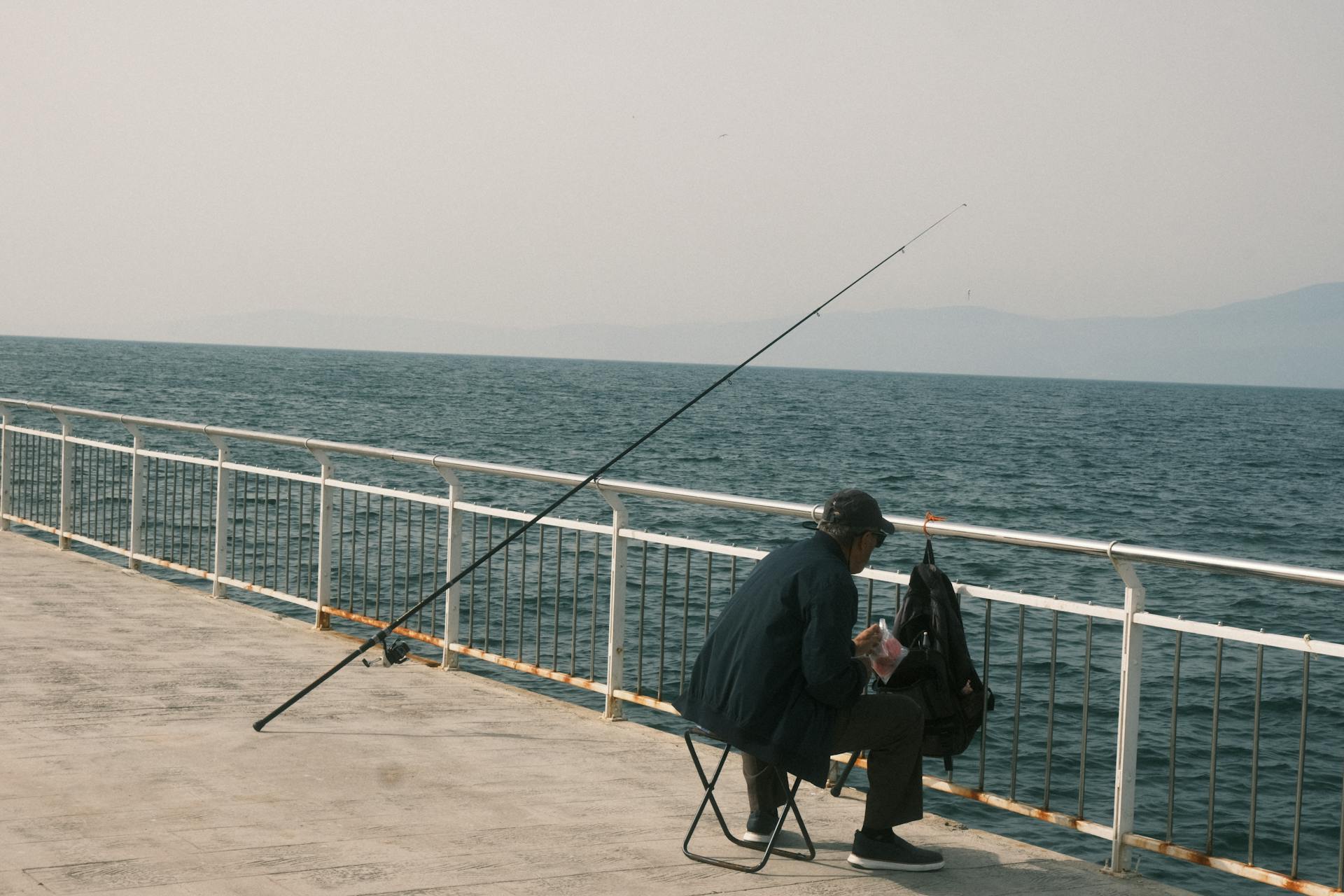 Fisherman on a Pier