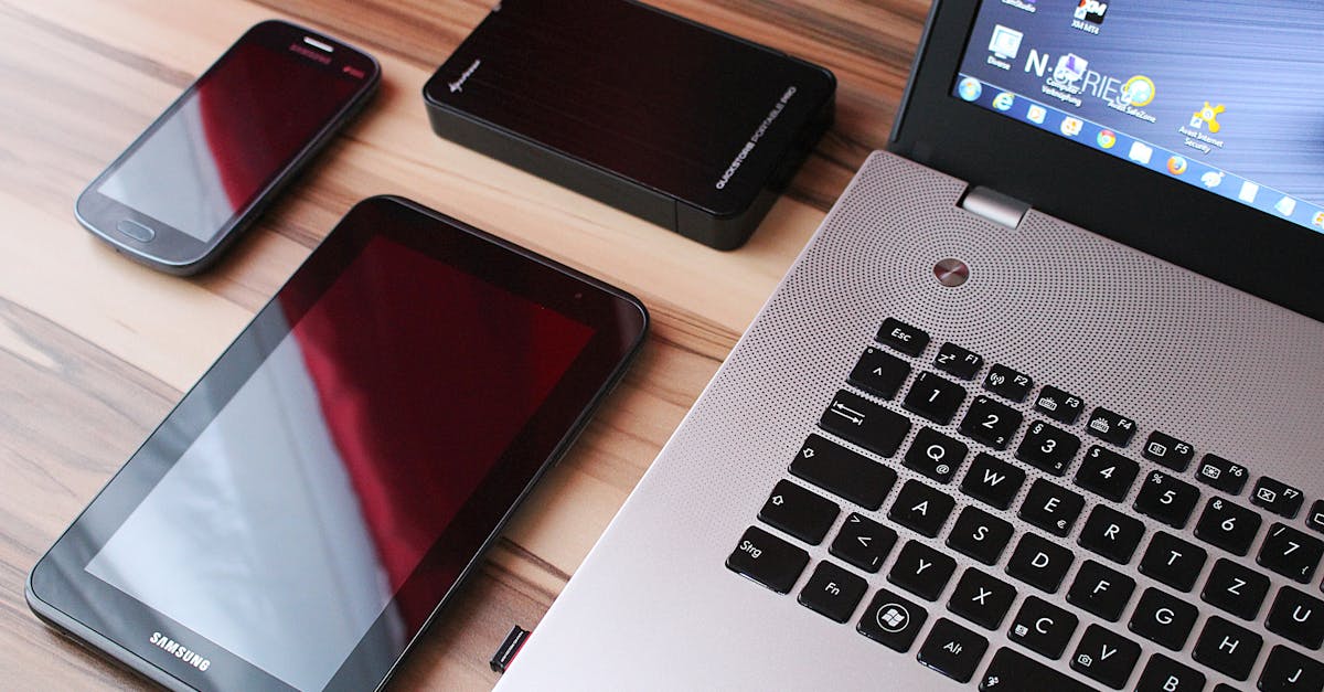 Free picture: office, laptop computer, digital camera ... Black Samsung Tablet Beside Laptop Computer · Free Stock Photo