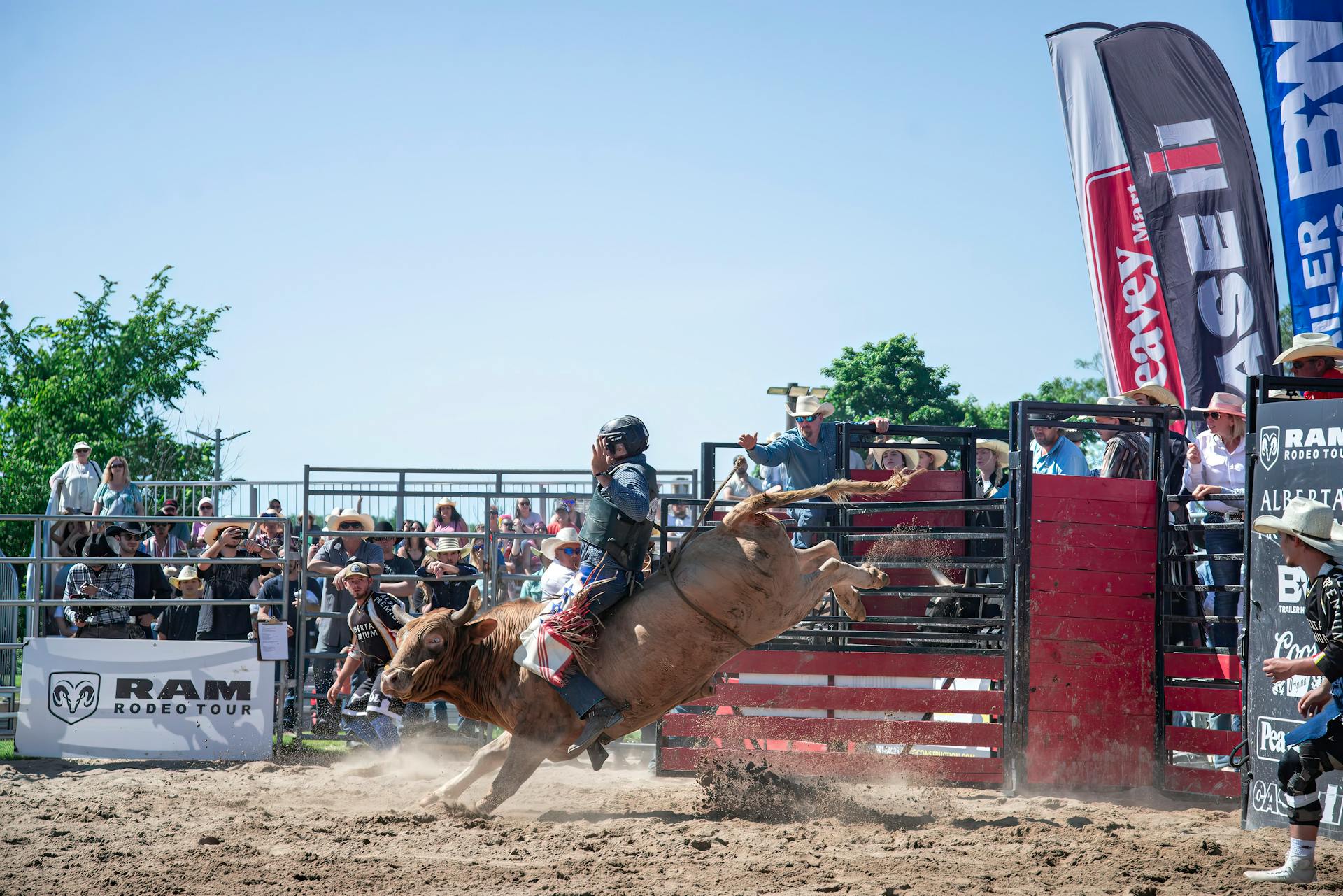 Man Riding Bull in Rodeo