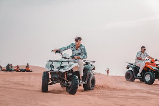 Experience the thrill of quad biking across sunlit desert dunes. Perfect for adventure seekers.