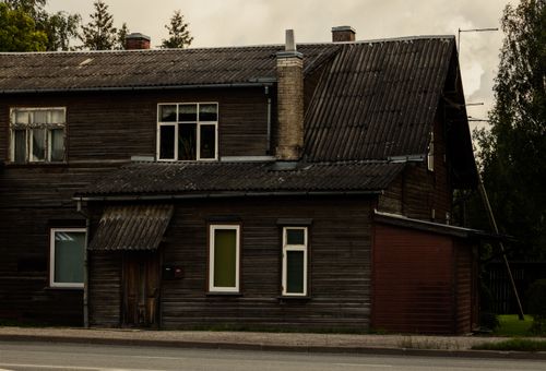 Free A rustic wooden house in Tartu displaying traditional architecture and charm. Stock Photo
