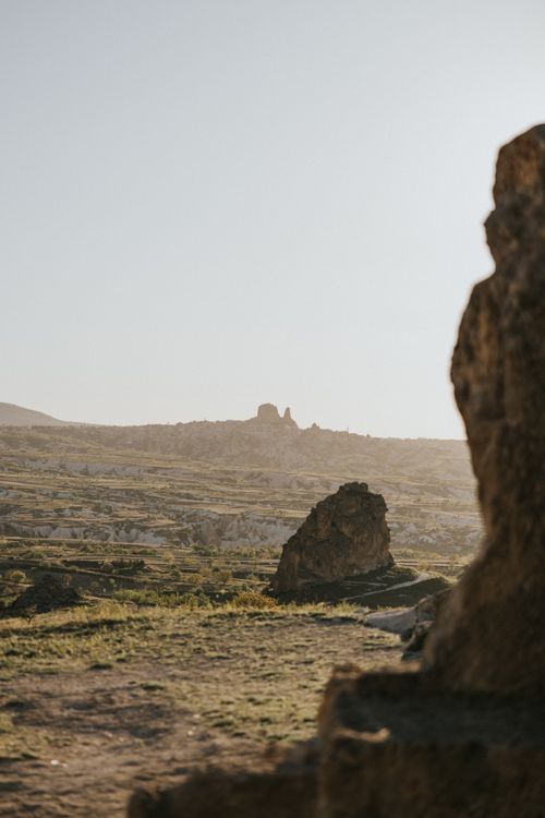 Free A tranquil view of the Göreme landscape in Cappadocia, Türkiye captured at dawn. Stock Photo