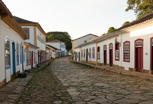 Free Cobblestone street and colorful colonial houses in Tiradentes, Brazil. Stock Photo