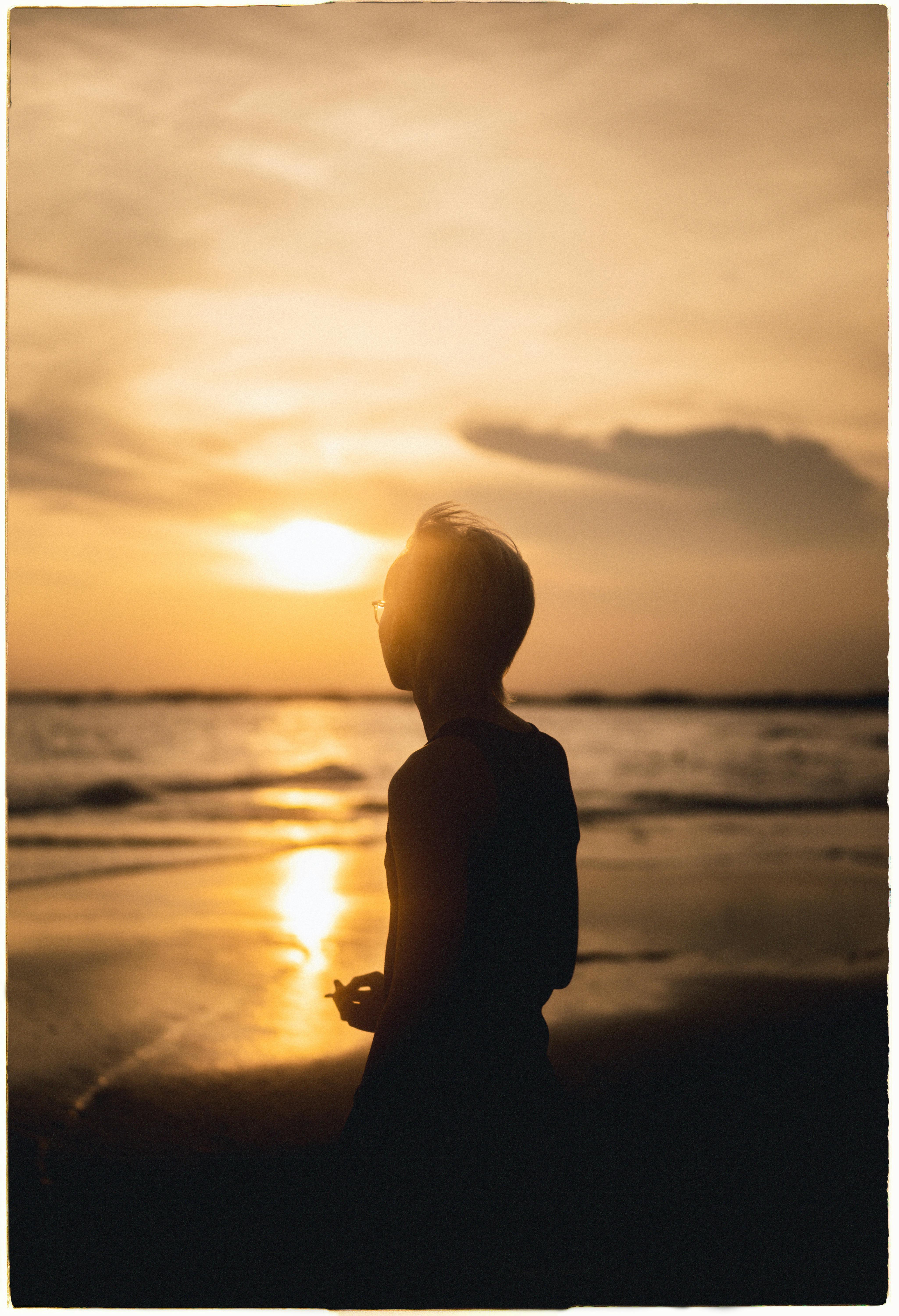 silhouette of man during sunset