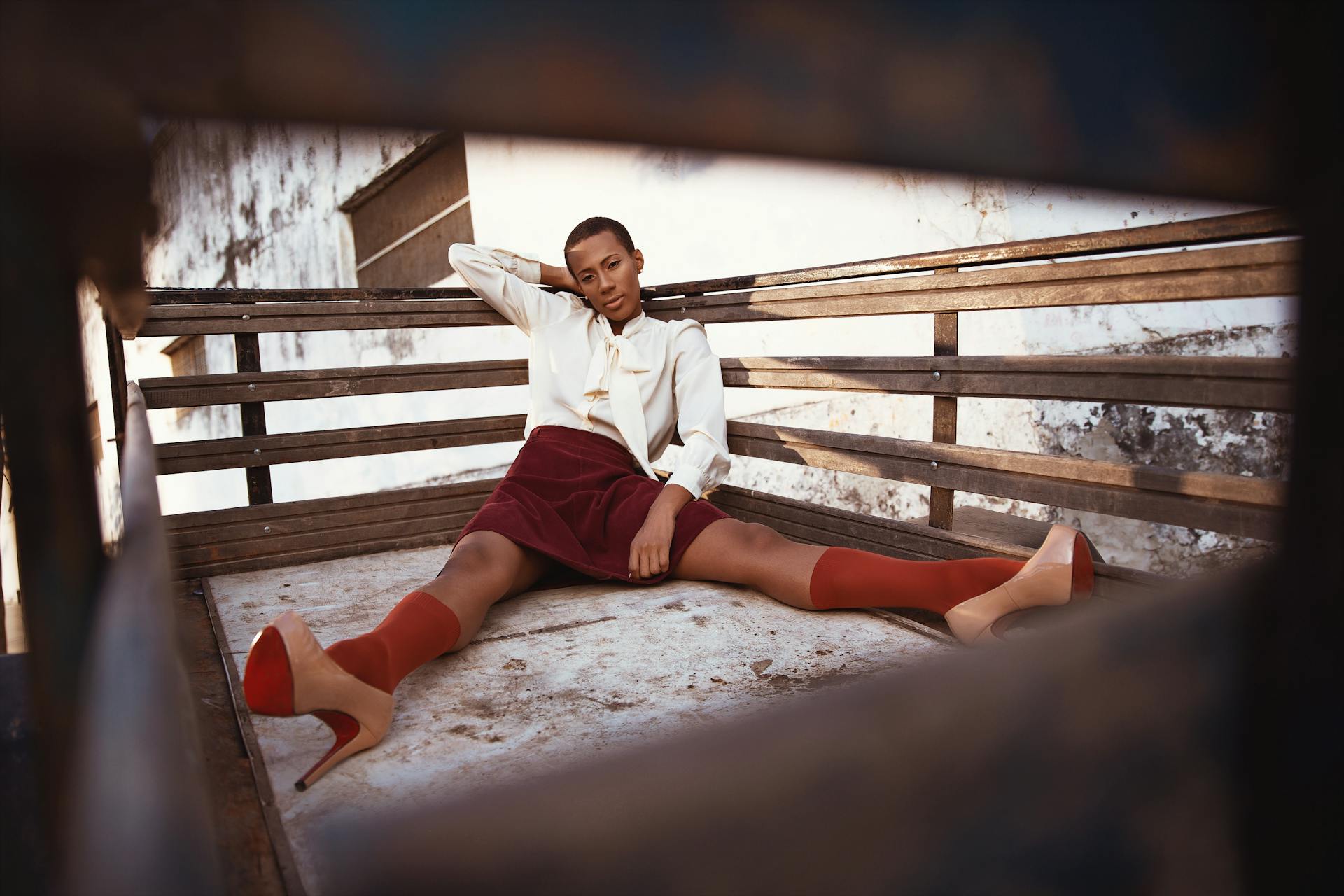 Woman Sitting on Wooden Carriage