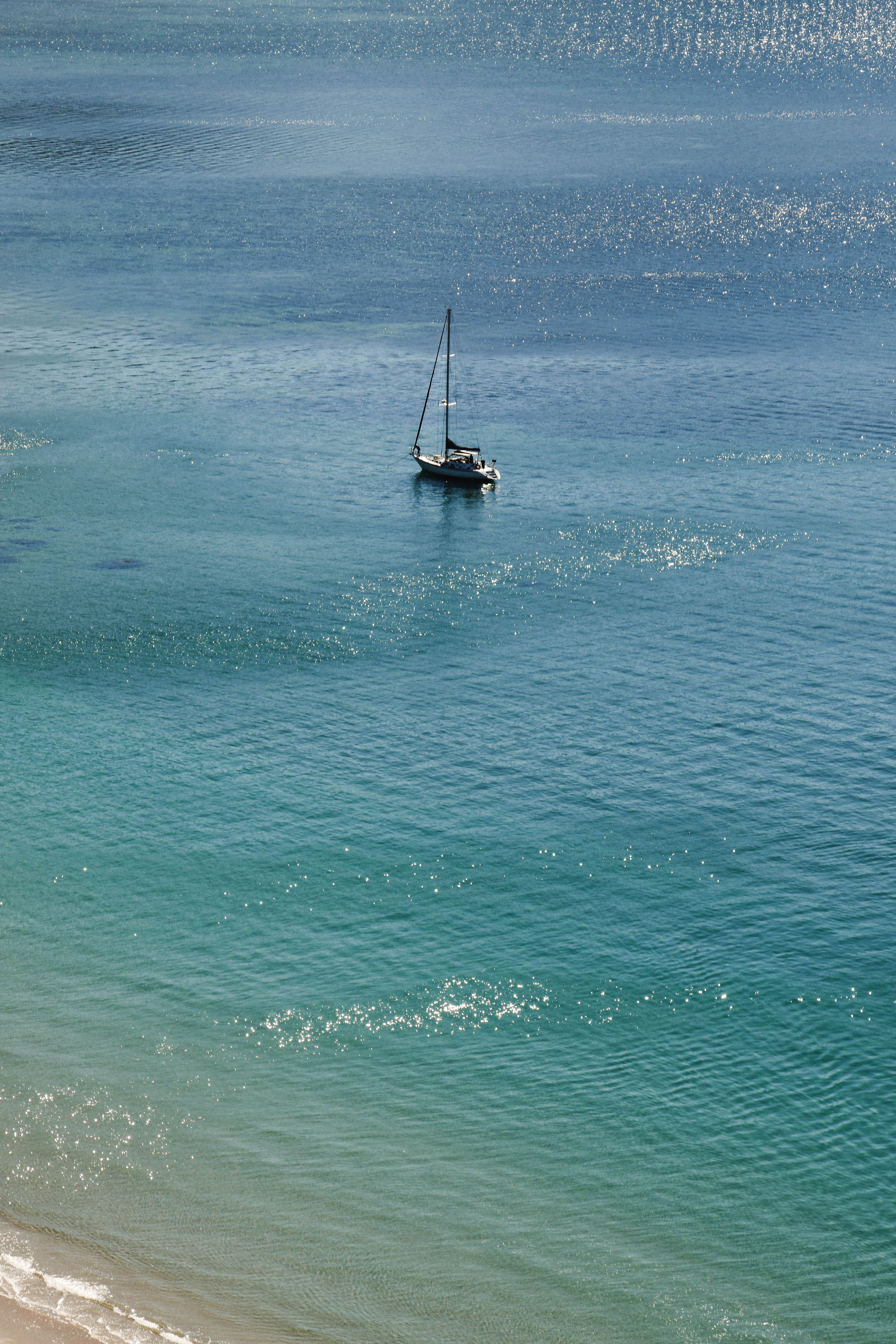 Aerial View of a Single Boat on the Sea · Free Stock Photo