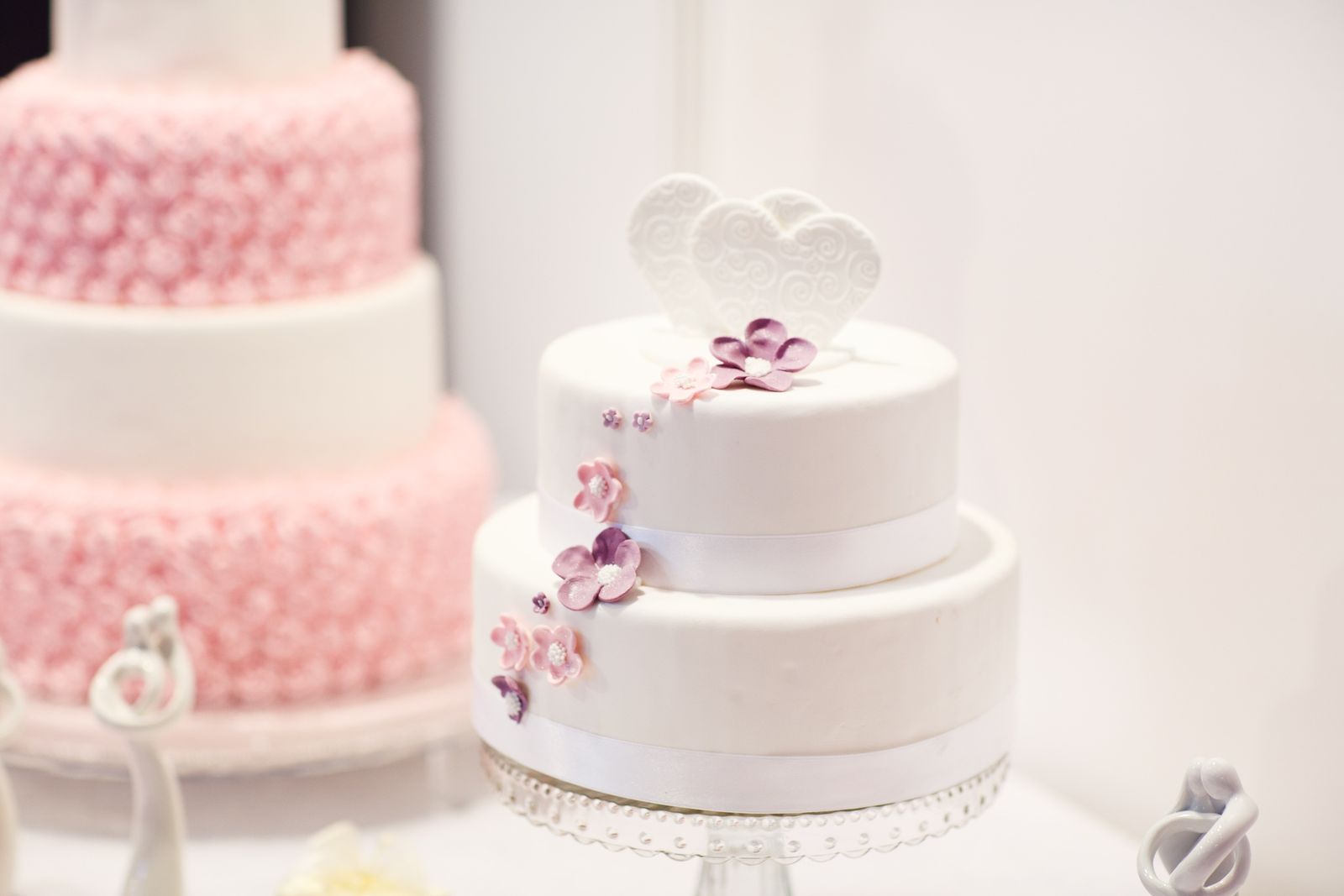 Afternoon tea setup with cakes and flowers