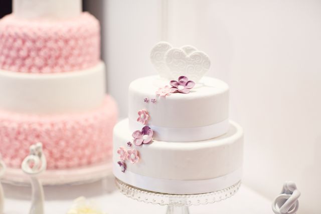 Afternoon tea setup with cakes and flowers