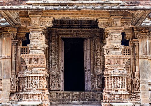Free A detailed view of an ancient carved temple entrance showcasing intricate architecture in Rajasthan, India. Stock Photo
