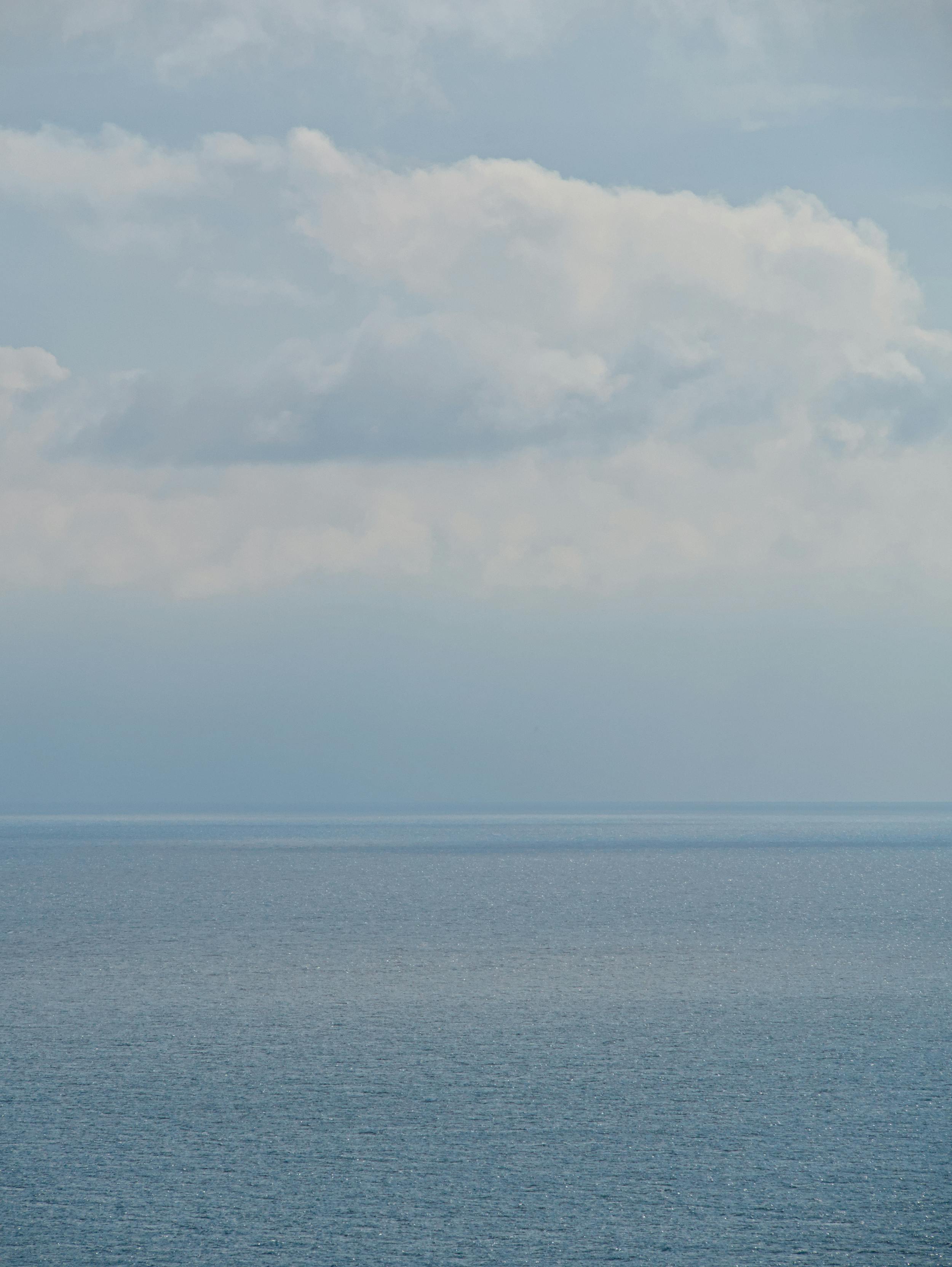 grátis Nuvem No Céu Sobre O Mar Foto profissional