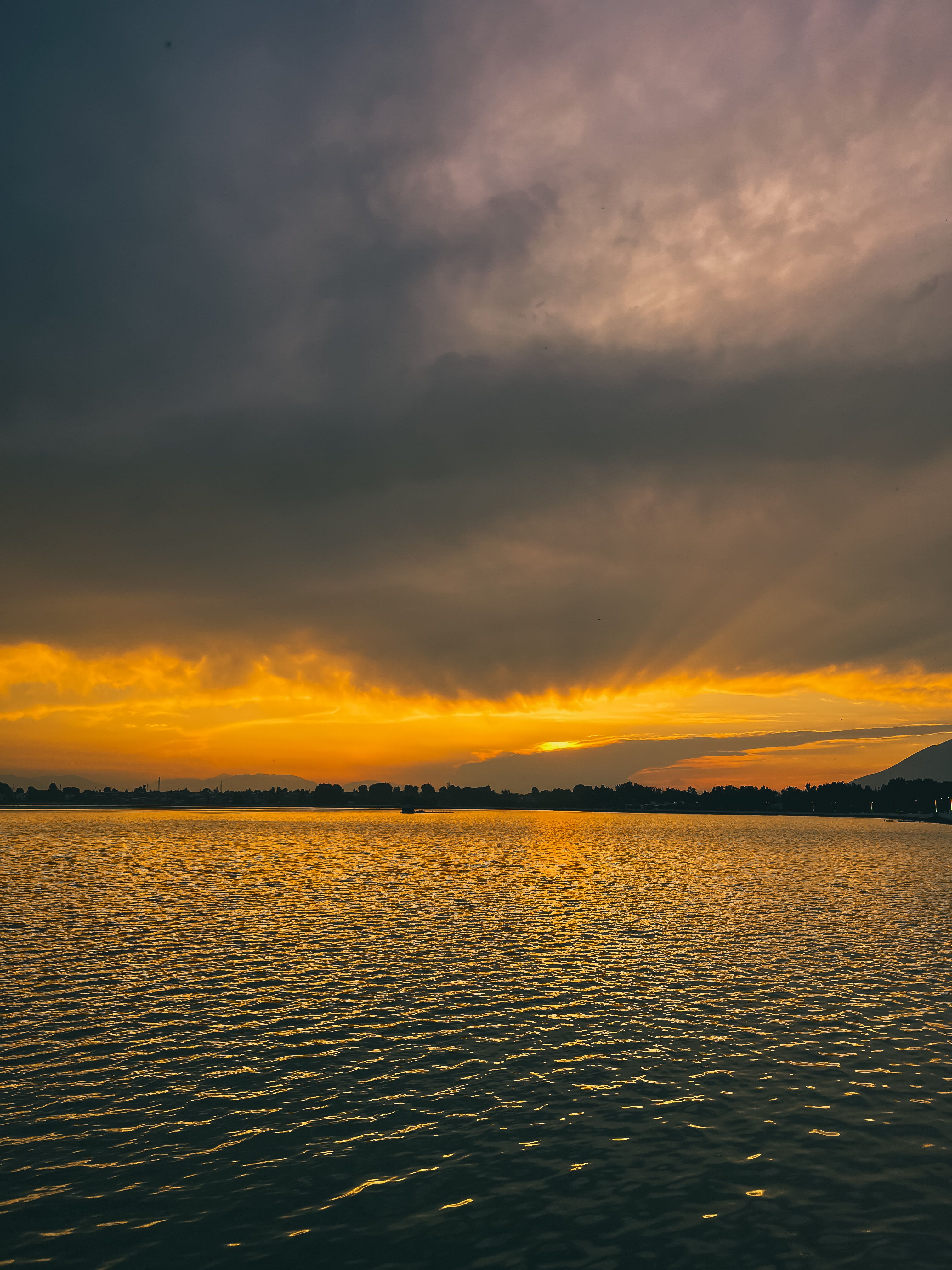 Storm Cloud over Sea Coast at Sunset · Free Stock Photo