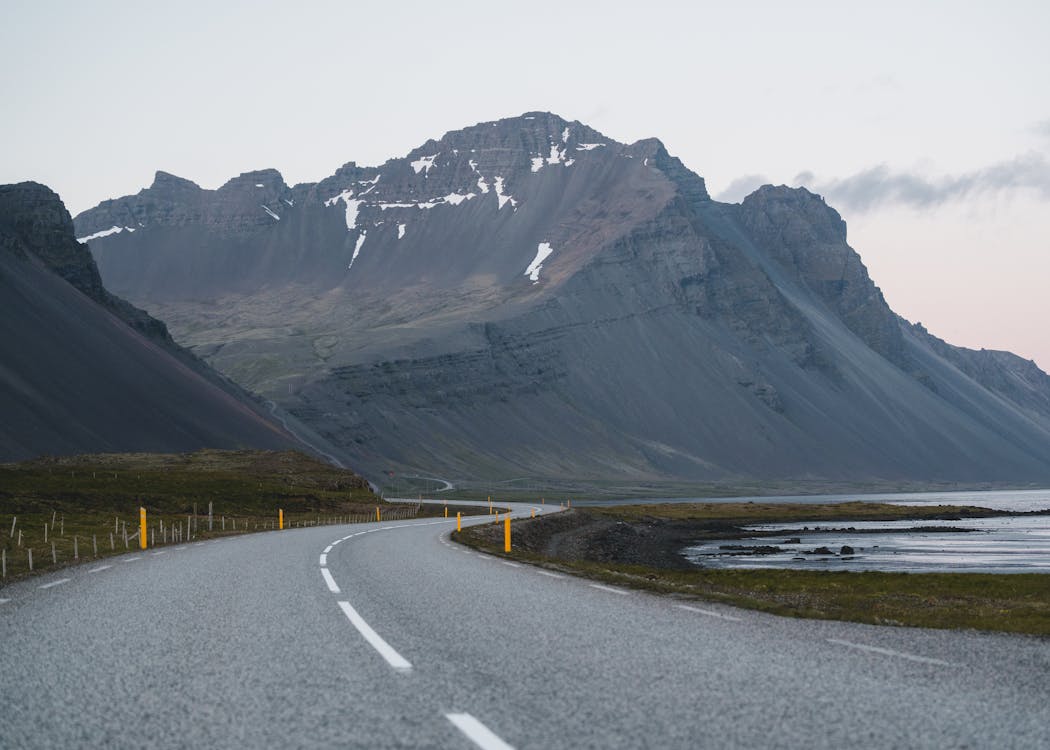 Free Empty Road Against Mountain Background Stock Photo